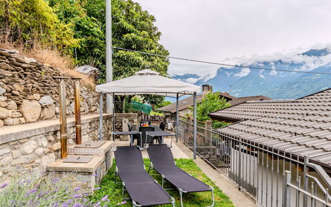 Santa Croce View: Cloud, Plant, Sky, Mountain, Architecture, Outdoor Furniture, Shade, Grass, Leisure, Urban Design