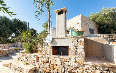 Trulli Di Grieco: Sky, Property, Plant, Building, Land Lot, Tree, Cottage, Facade, Landscape, Window