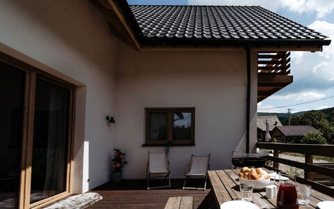 Domek Pod Szarowym Lasem: Cloud, Building, Property, Sky, Plant, Table, Window, Wood, Shade, Flowerpot
