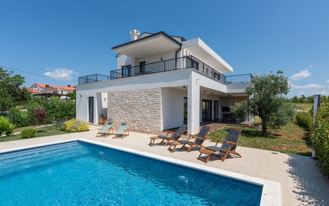 Villa Tola: Water, Sky, Plant, Property, Building, Swimming Pool, Azure, Cloud, Tree, Shade