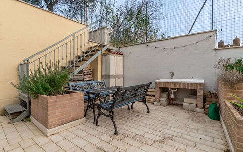Casale Al Mare: Plant, Property, Building, Wood, Table, Road Surface, Architecture, Tree, Chair, Outdoor Furniture