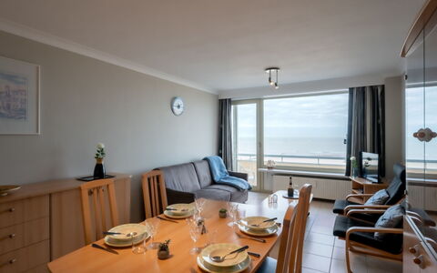 Seaview Getaway Belgium: Table, Furniture, Property, Chair, Wood, Lighting, Building, Couch, Floor