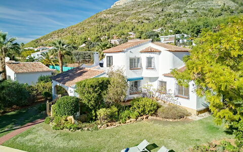 Villa del Tauro: Water, Sky, Cloud, Property, Swimming Pool, Building, Plant, Seaside Resort, Tree, Outdoor Furniture
