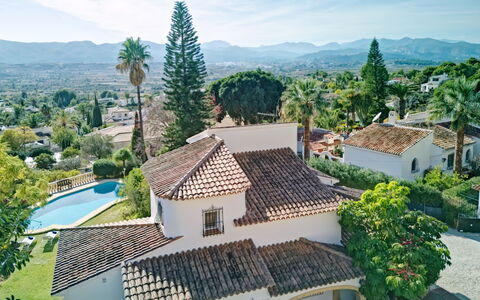 Villa del Tauro: Water, Sky, Cloud, Property, Swimming Pool, Building, Plant, Seaside Resort, Tree, Outdoor Furniture