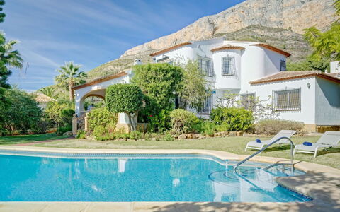 Villa del Tauro: Water, Sky, Cloud, Property, Swimming Pool, Building, Plant, Seaside Resort, Tree, Outdoor Furniture