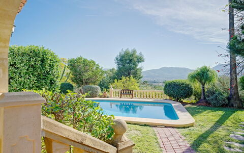 Villa del Tauro: Water, Sky, Cloud, Property, Swimming Pool, Building, Plant, Seaside Resort, Tree, Outdoor Furniture