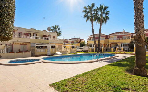Lomas de Cabo Roig: Water, Sky, Cloud, Property, Swimming Pool, Building, Plant, Seaside Resort, Tree, Outdoor Furniture