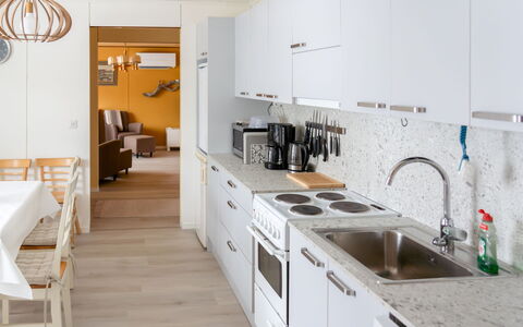 Hallanvaara: Furniture, Countertop, Kitchen, Interior Design, Flooring, Cabinetry, Floor, Kitchen Appliance, Wood, Light Fixture