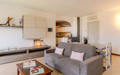 Di Lalla: Furniture, Interior Design, Flooring, Couch, Floor, Wood, Room, Living Room, Apartment, Table