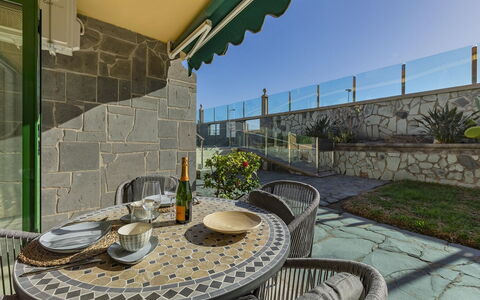 Aquarius 4: Plant, Table, Property, Tableware, Sky, Furniture, Flowerpot, Building, Chair, Outdoor Table