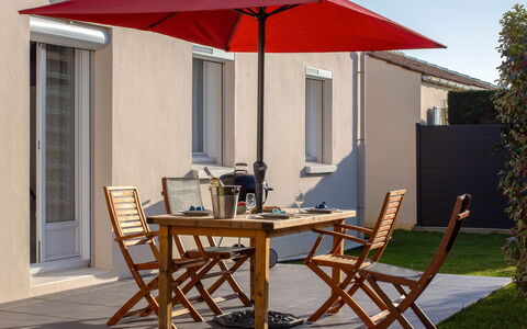 Les Pêcheries: Furniture, Building, Property, Table, Chair, Window, Plant, Shade, Outdoor Furniture, Umbrella