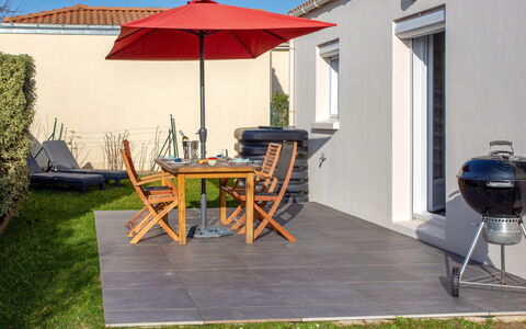 Les Pêcheries: Furniture, Property, Building, Table, Plant, Chair, Sky, Shade, Outdoor Furniture, Outdoor Table