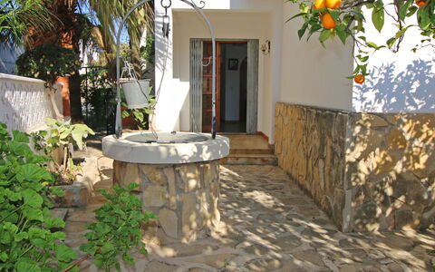 Casa Las Mañas: Plant, Building, Sky, Window, Tree, House, Land Lot, Neighbourhood, Urban Design, Residential Area