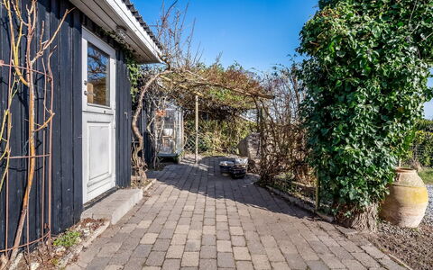 Sylvia - 450M from the Sea: Roof, Home, Door, Cottage, Shade, Siding, Yard, Estate, Backyard