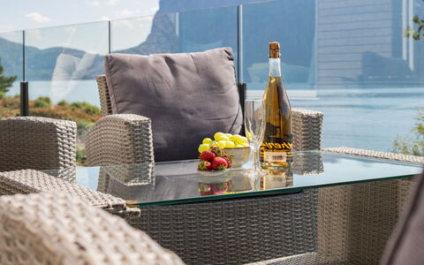 Hildebu: Sky, Property, Table, Furniture, Bottle, Plant, Interior Design, Outdoor Furniture, Real Estate, Cloud