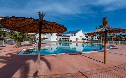 Horizon Golf: Cloud, Water, Sky, Plant, Building, Swimming Pool, Azure, Outdoor Furniture, Sunlounger, Umbrella