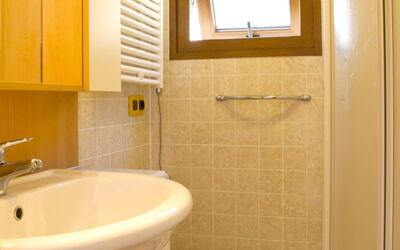 Camping Village Capo D'Orso 59.3: Brown, Tap, Property, Plumbing Fixture, Bathroom Sink, Sink, Bathroom, Window, Wood, Building