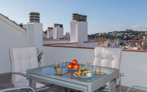 Jardins de S'Agaro: Furniture, Interior Design, Table, Room, Floor, Flooring, Chair, Home, Apartment, Houseplant