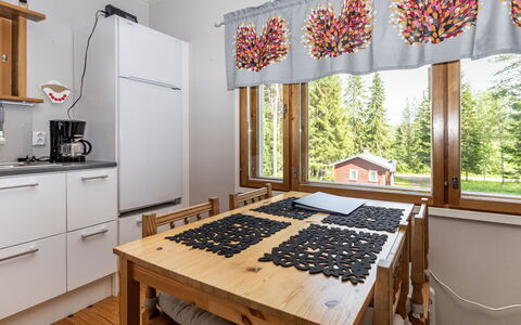 Mokko-Mökki: Furniture, Chair, Outdoor Furniture, Table, Wood, Outdoor Table, Kitchen & Dining Room Table, Shade, Garden, Umbrella