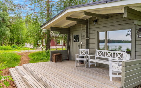 Villa Kuorinka: Bed, Furniture, Bedroom, Interior Design, Bedding, Bed Sheet, Flooring, Wood, Floor, Room