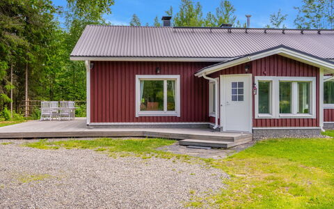 Villa Kuorinka: Bed, Furniture, Bedroom, Interior Design, Bedding, Bed Sheet, Flooring, Wood, Floor, Room