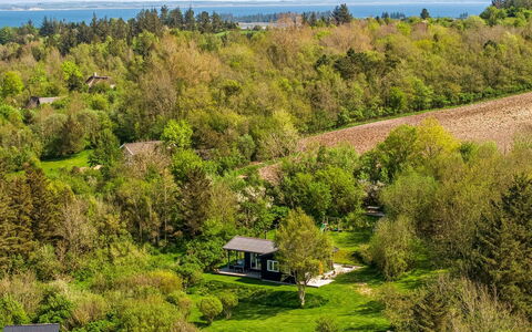 Analia - 300M to the Fjord: Furniture, Interior Design, Couch, Flooring, Floor, Living Room, Room, Table, Chair, Apartment