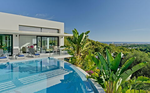 Villa Juno: Building, Cloud, Furniture, Window, Sky, Azure, Wood, Interior Design, Shade