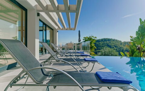 Villa Juno: Building, Cloud, Furniture, Window, Sky, Azure, Wood, Interior Design, Shade