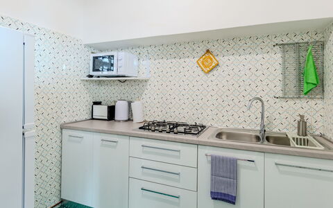 Dani: Cabinetry, Property, Countertop, Building, Sink, Interior Design, Kitchen, Floor, Wall, Flooring