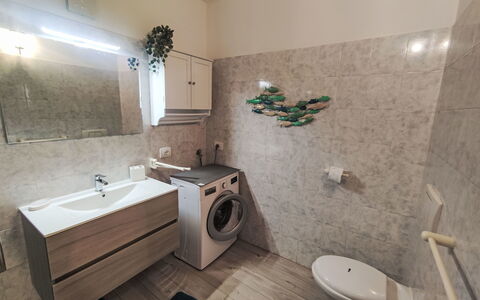 Welcome 2 Riva: Plumbing Fixture, Tap, Property, Mirror, Building, Bathtub, Sink, Bathroom Sink, Bathroom, Interior Design