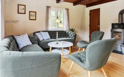 Hila: Furniture, Interior Design, Flooring, Floor, Wood, Living Room, Couch, Wood Flooring, Table, Home