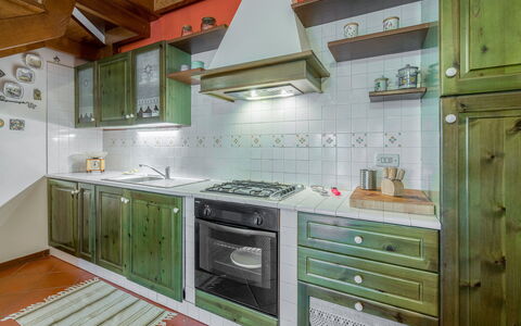 Casa Bellosguardo a Vinci: Cabinetry, Property, Countertop, Furniture, Kitchen Sink, Gas Stove, Drawer, Kitchen Stove, Cooktop, Kitchen