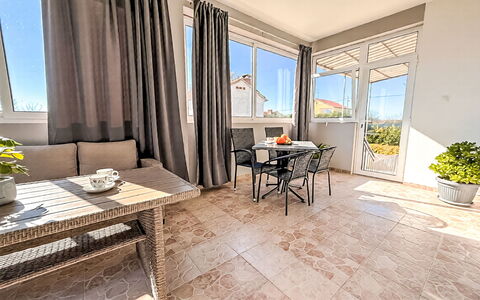 Ivan: Furniture, Flooring, Floor, Outdoor Furniture, Chair, Shade, Deck, Balcony, Wood Flooring, Resort