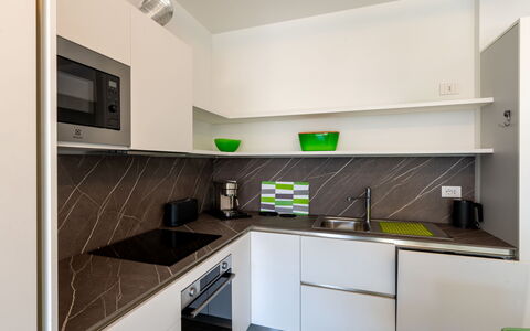 Gravedona 165: Kitchen, Kitchen Appliance, Countertop, Interior Design, Major Appliance, Flooring, Wood, Cabinetry, Furniture, Kitchen Stove