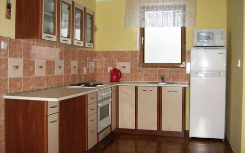 Smrž: Cabinetry, Countertop, Kitchen Sink, Kitchen, Window, Wood, Sink, Kitchen Stove, Building, Interior Design