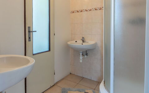 Smrž: Flooring, Floor, Plumbing Fixture, Bathroom, Interior Design, Ceiling, Plumbing, Toilet, Room, Bathroom Sink