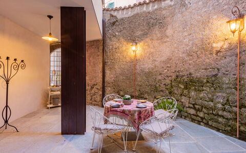 La Loggia: Table, Furniture, Chair, Plant, Wood, Architecture, Interior Design, Building, Flooring, Floor