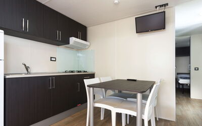Baia Holiday Gasparina 687.2: Cabinetry, Property, Countertop, Wood, Interior Design, Flooring, Kitchen, Floor, Wood Stain, Hardwood