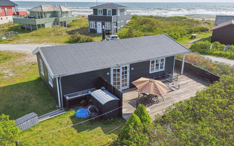 Baarde - 60M from the Sea: Roof, Home, Door, Cottage, Shade, Siding, Yard, Estate, Backyard