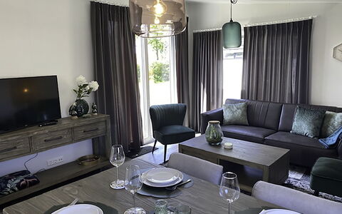 De Noordzee: Table, Furniture, Property, Couch, White, Black, Tableware, Picture Frame, Lighting, Purple