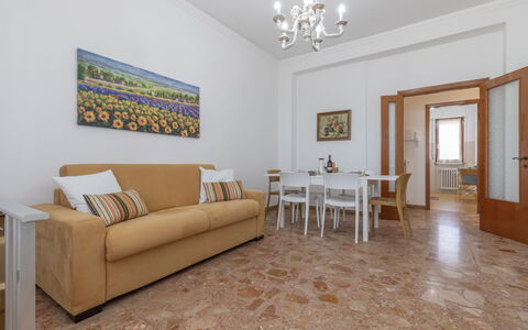 Casa Rivamare: Picture Frame, Couch, Furniture, Table, Living Room, Wood, Lighting, Comfort, Building, Architecture