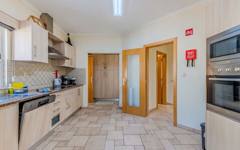 Carmen: Flooring, Floor, Wood, Ceiling, Interior Design, Lighting, Cabinetry, Room, Kitchen, Apartment