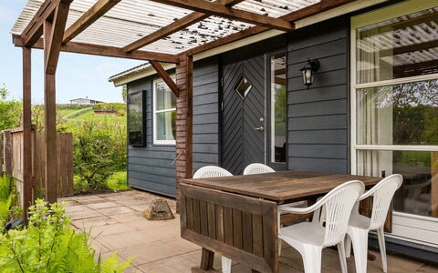 Venla - 150M from the Sea: Wood, Furniture, Outdoor Furniture, Porch, Hardwood, Door, Wood Stain, Outdoor Table, Plank, Deck