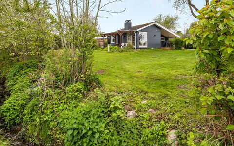Venla - 150M from the Sea: Grass, Green, Shrub, House, Cottage, Garden, Land Lot, Home, Groundcover