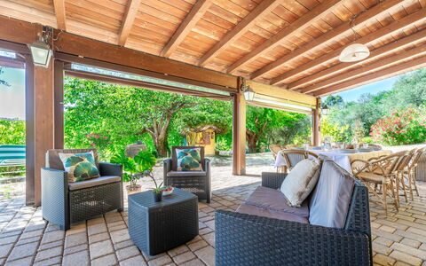 Villa La Pagliarina: Furniture, Plant, Azure, Shade, Wood, Chair, Floor, Leisure, Tree, Cottage