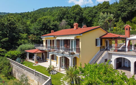 Villa Valy: Plant, Building, Property, Window, Sky, Cloud, Tree, House, Real Estate, Residential Area