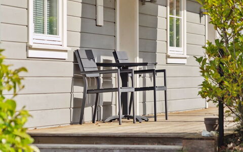 Marrit - 500M from the Sea: Furniture, Outdoor Furniture, Chair, Porch, Outdoor Table, Door, Siding, Shade, Hardwood