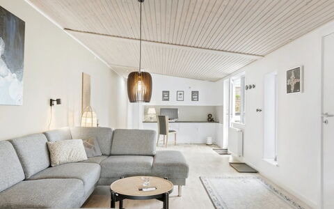 Edin - 100M from the Sea: Wall, Interior Design, Wood, Ceiling, Flooring, Floor, Home, Light Fixture, Couch, Living Room