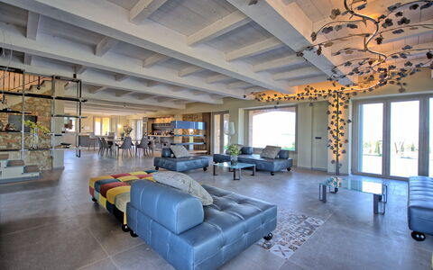 Villa Campana: Property, Building, Couch, Interior Design, Lighting, Architecture, Window, Floor, Studio Couch, Flooring
