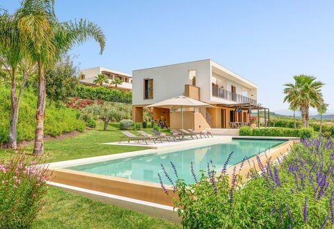 Villa Smeraldo - Sea Front | By Rocco Forte Villas: Plant, Water, Property, Building, Sky, Azure, Tree, Flower, Architecture, Swimming Pool